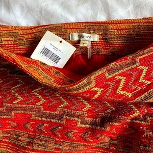 Women’s size 6 Tyler Boe above knee skirt. New with tags